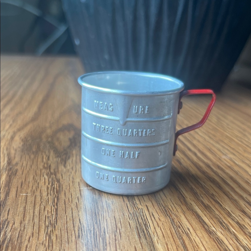 Vintage Silver Measuring Cup with Red Handle